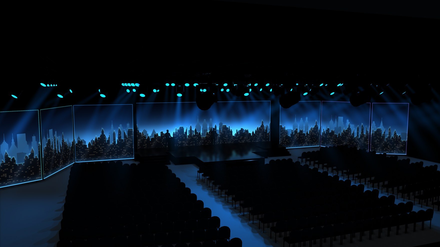 Millumin PreViz from house left: a blue-hour skyline framed on each of seven LED walls, moving heads taking their color from the screens, the presenter at the lectern